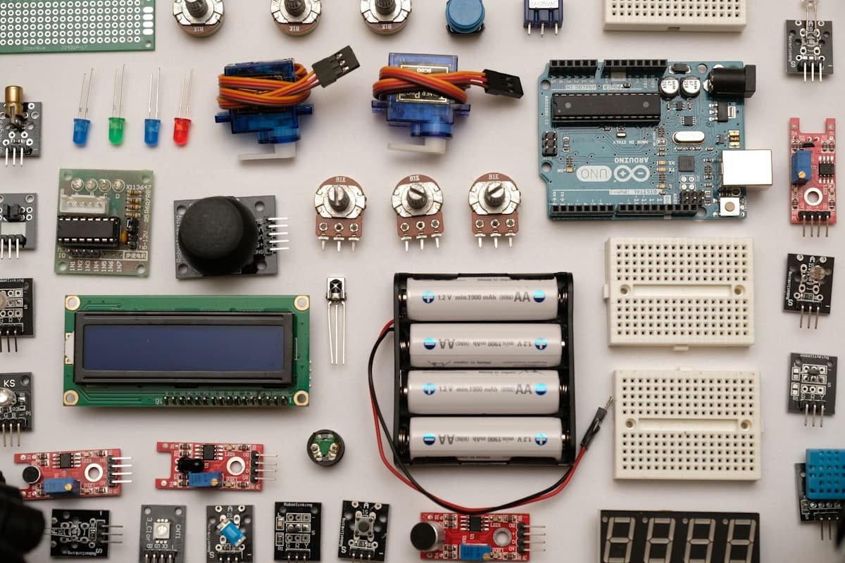 Flat lay of circuit boards, sensors and electronic components